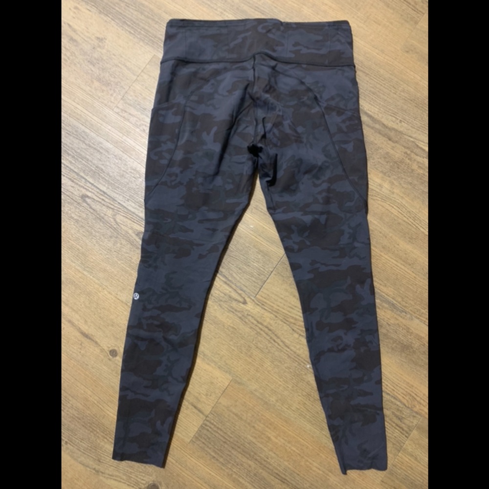 Lululemon navy camo leggings with pockets. Size 12, like new condition.